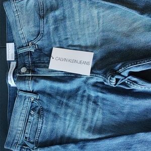 New Men's Calvin Klein Blue Jeans, size W33 x L30, straight leg jeans